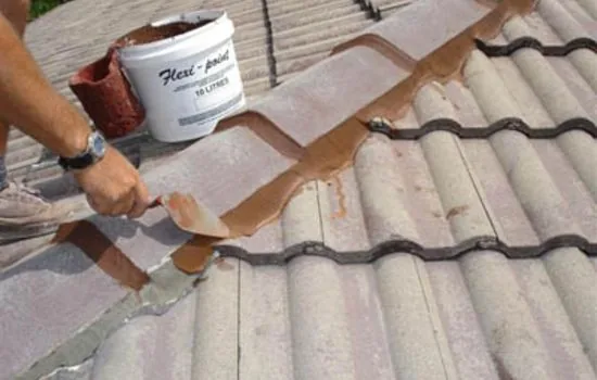 Application of waterproof coating to a roof surface